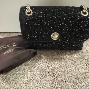 Black Sparkle Kate Spade purse. Used one bought new complete with dust bag.